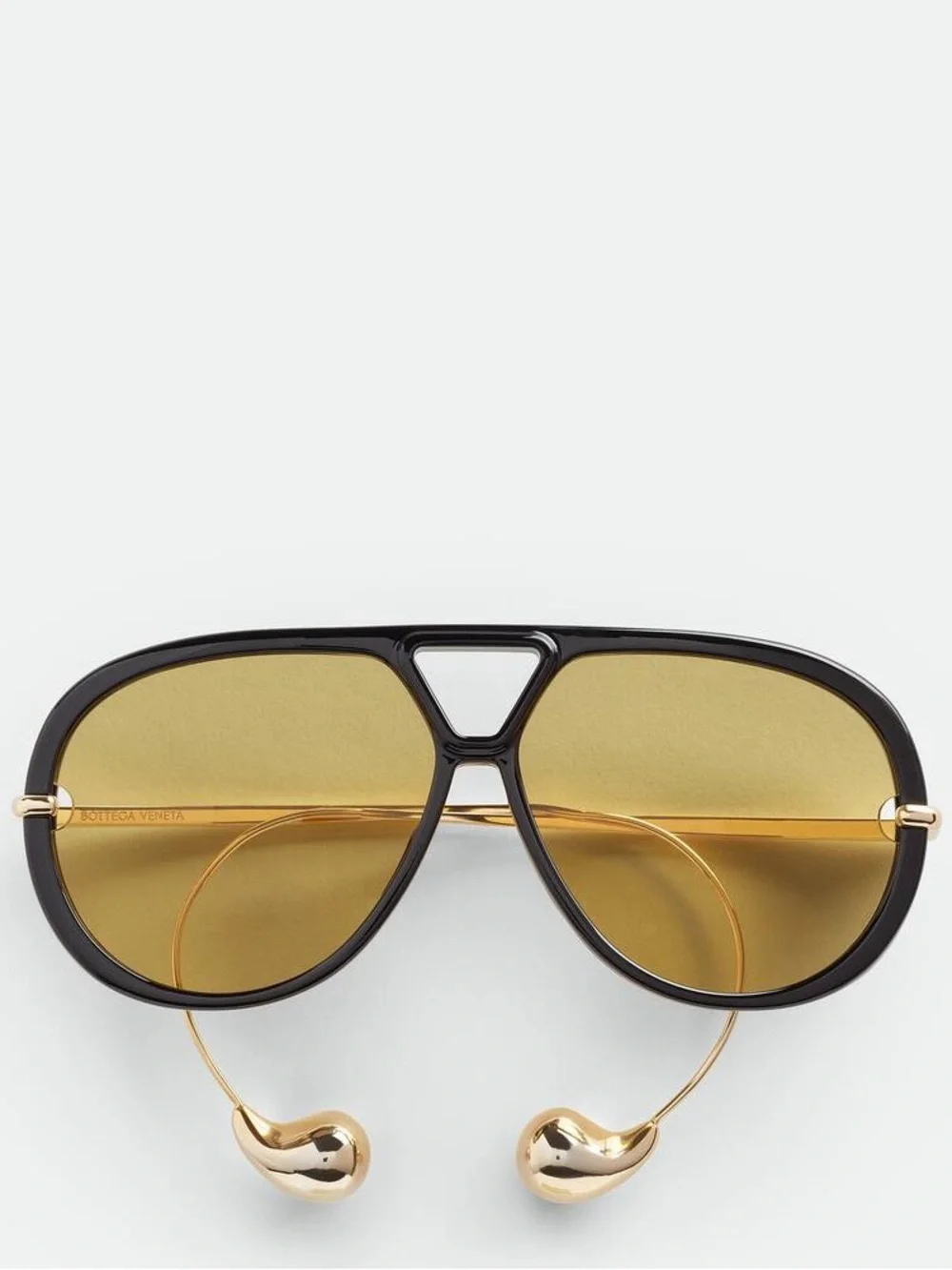 Bottega Veneta Black Frame Sunglasses with Amber Lenses and Gold Details